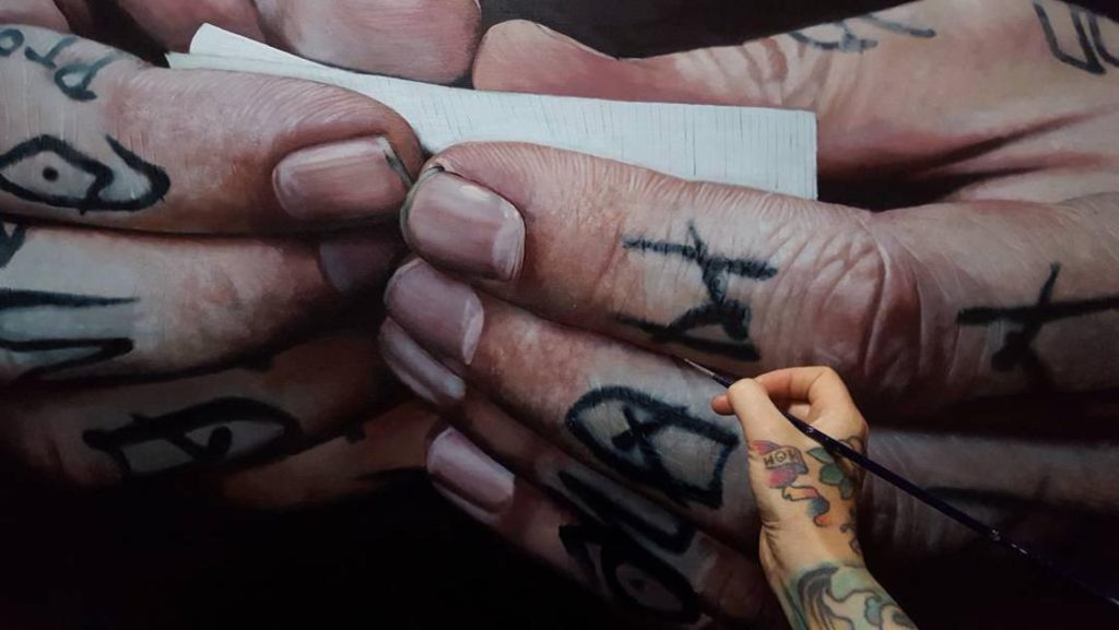 getatoeëerde handen hand-tattoos